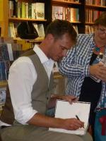 Jason Hewitt signing books in Browsers